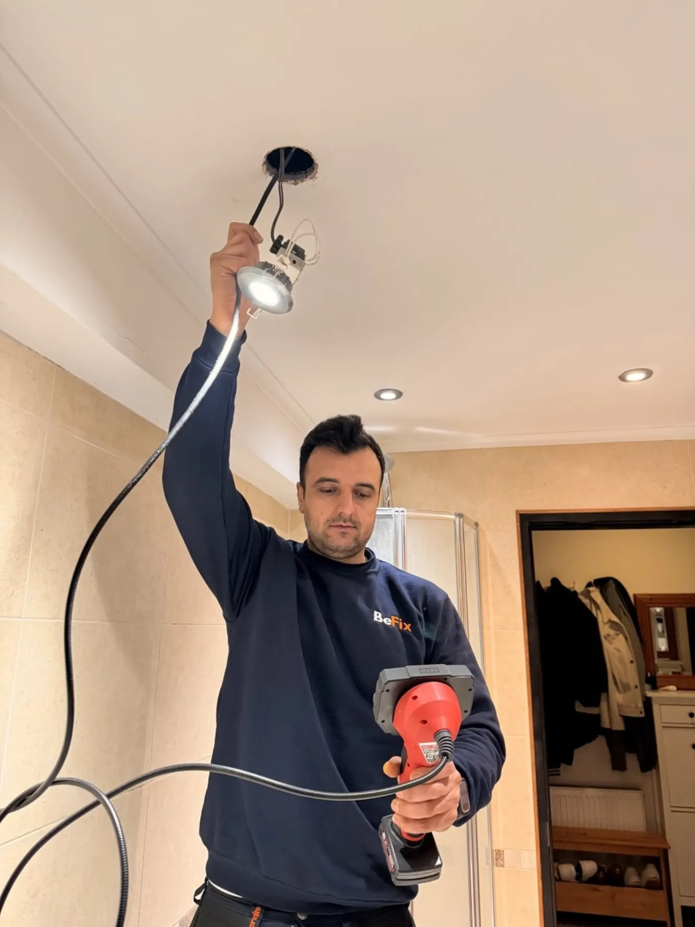 BeFix leak detection specialist carrying out trace and access in a London home